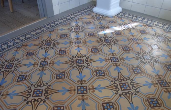 A period octagon ceramic with cabochons in a Gotland, Sweden bathroom 