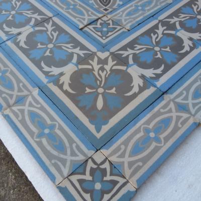 A small triple border antique French ceramic floor