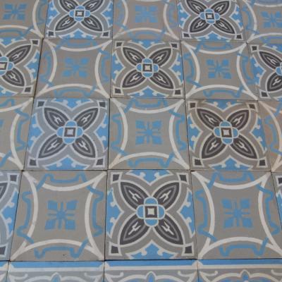 A small triple border antique French ceramic floor