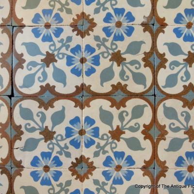 A small 8.5m2 French floral themed antique ceramic floor