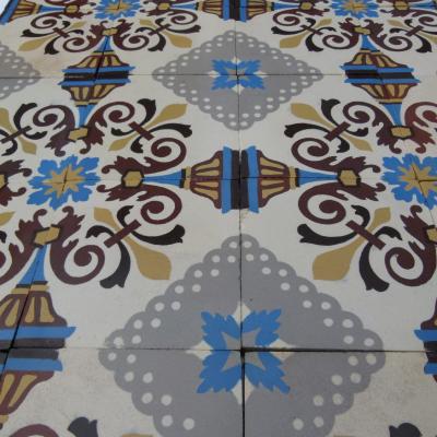 A small antique Belgian ceramic floor with two borders