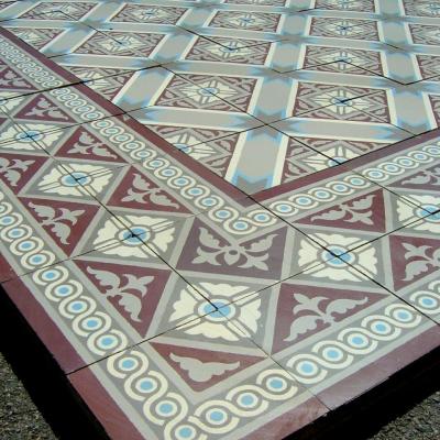 A French Winckelmans ceramic floor with same size borders