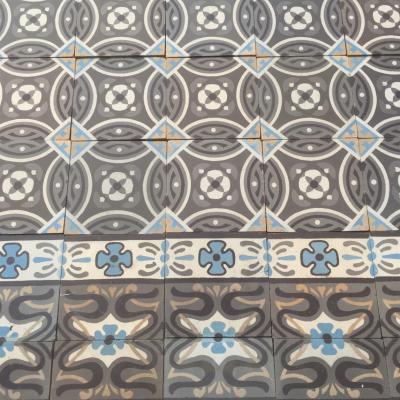 c.11.5m2 antique Belgian ceramic with back to back borders
