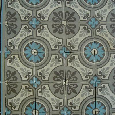 A 5m2 antique French ceramic floor in a cool palette