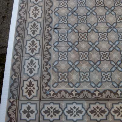 A large, 27.5m2+ classically geometric French ceramic floor with original triple borders