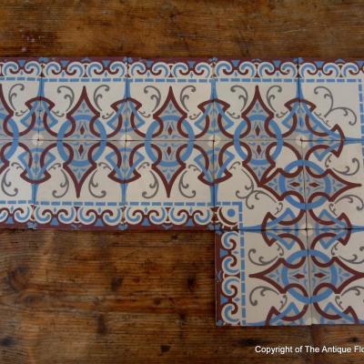 Large run of ceramic back to back art nouveau border tiles