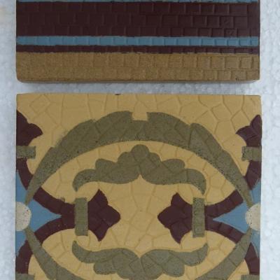 A handmade Boch Freres floor of octagon tiles with cabochons