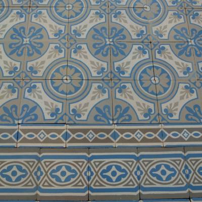 A 7.75m2+ antique ceramic floor in light grey, blue and cream