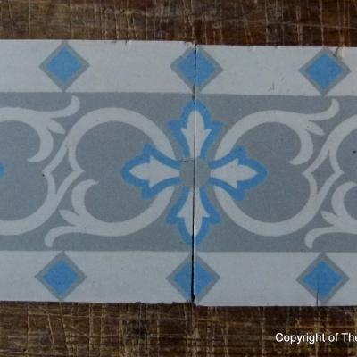 24 antique ceramic border tiles manufactured by Octave Colozier c.1912