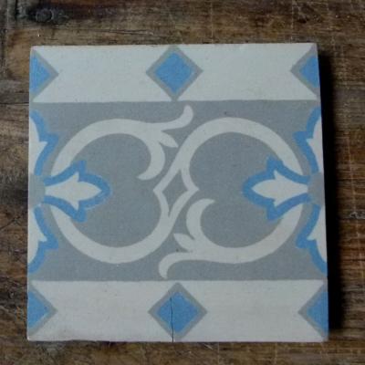 Antique ceramic tiles in a cool palette 1880-1910 