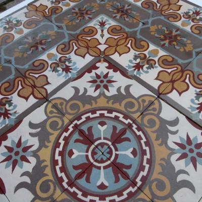 A 20.75m2 antique French Maubeuge ceramic with its original borders